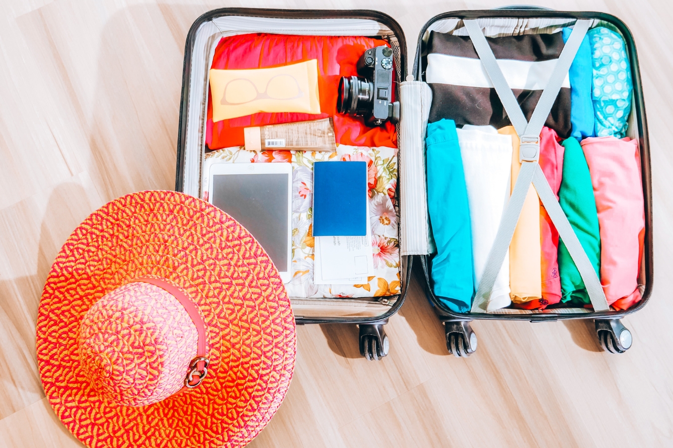 Flat lay of a luggage with Must-Have Travel Accessories on Amazon.